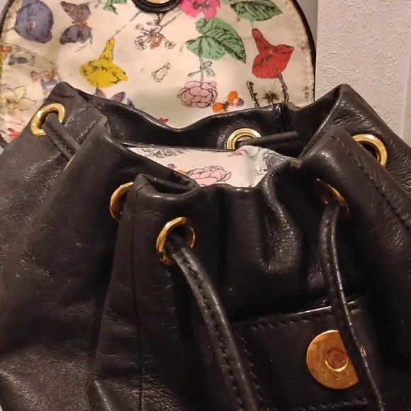 Juicy Couture | Bags | Juicy Couture Gold And Black Backpack  display picture 1